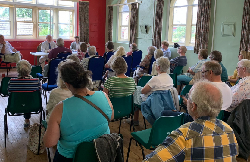 Geoffrey speaks to residents alongside local cllrs