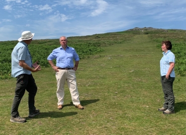 Geoffrey with officials at Cox Tor