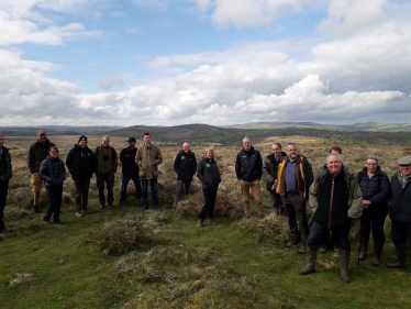 Geoffrey with local farmers and stakeholders