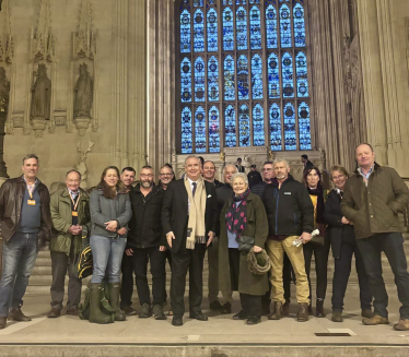 Sir Geoffrey with farmers from Devon on the steps in Westminster Hall